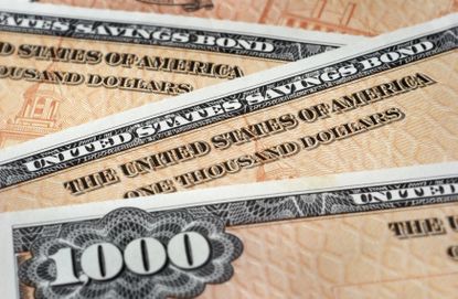 lose up photograph of U.S. Savings Bonds.